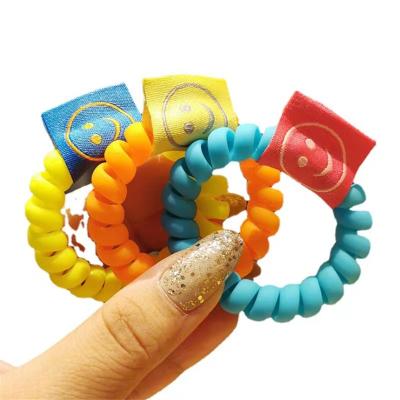 China New version of sweet soft feeling of candy color telephone cord single hair ring. Fluorescent Smiley Face Tag Hair Rope for sale