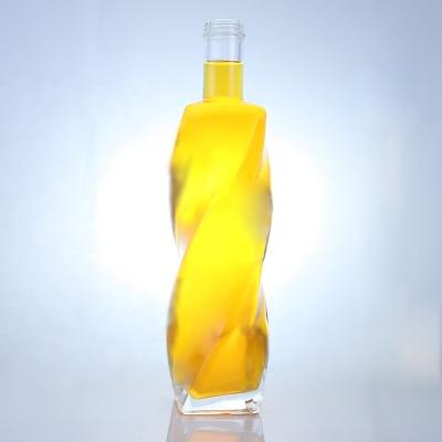 China Customized Logo Special Shaped Glass Bottle Spirits 700ml 750ml With Screw Cap for sale
