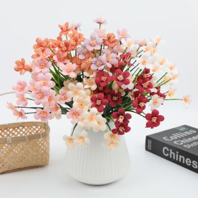 China Simulated flower daisy home decoration, spring grass orchid wedding, outdoor flower arrangement decoration, artificial plastic fake flower for sale