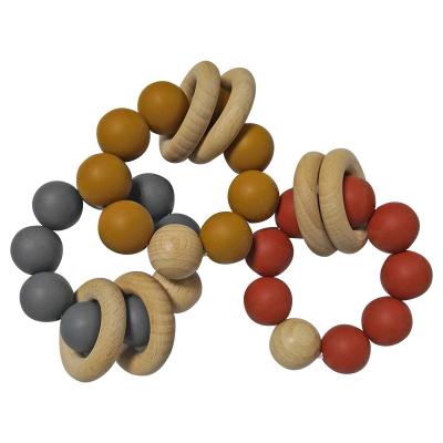 Китай Изготовленный на заказ силикон отбортовывает Teether 9*7.5*4cm с деревянным браслетом 2 продается