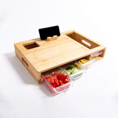 China Viable bamboo cutting board with containers and phone holder for sale