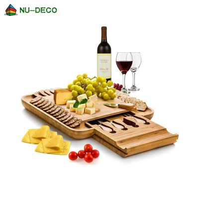China Sustainable Natural Color Charcuterie Cheese Eco Friendly Organic Wooden Bamboo Board With Knife Set for sale