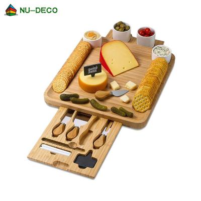 China Sustainable New Design Bamboo Cheese Cutting Board Set With 4 Pieces Knife Tools for sale