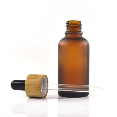 China Cosmetic custom 10ml 30ml 50ml 100ml amber cosmetic packaging bottle skin care essential oil dropper glass bottle for sale