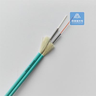 China Duplex OM3 Flat Spiral Armored Fiber Cable 3.0mm x2pcs Aque LSZH Rodent Resistent FTTH Te koop