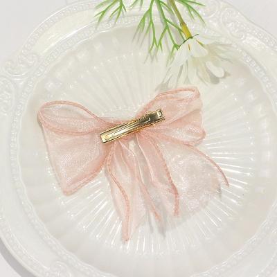 China Fashionable Casual Japanese Smart Pearl Bow Hair Clips Duck Hair Clip For Women Soft for sale