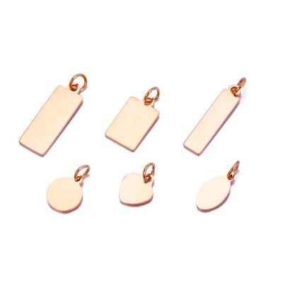 China TRENDY Logo Blanks Charm Round Oval Custom Jewelry Accessories Tags Stainless Steel Gold Pendant Charm For Necklace Bracelet Making for sale