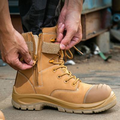 Chine Bottes de travail de sécurité en cuir de vache en blé Bottes de sécurité en caoutchouc en semelle de verre en fibre de verre Anti-écrasement Kevlar Anti-proof Bottes de travail à vendre