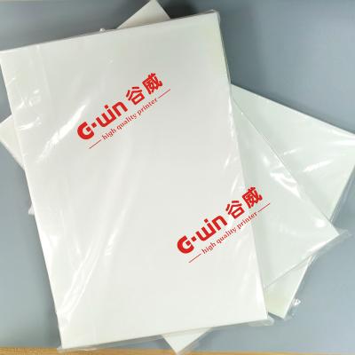 China Apparel heat transter DTF PET film A4 film for DTF printing use on epson L805 printers 1000pcs in one bag hot sale for sale