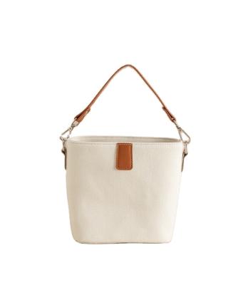 China The latest best-selling women's portable cross - body bag bucket bag canvas material, is sturdy and durable for sale