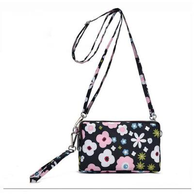 China 2023 high quality hot sale waterproof shoulder bag of travel portable floral nylon bag makeup for sale