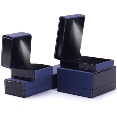 China Customer's Logo LED Light Jewelry Box for Bracelet Necklace and Ring in Blue Leather for sale