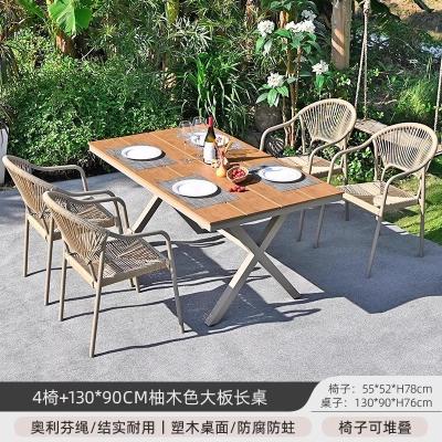 China Outdoor Courtyard Villa Chairs and Tables Garden Open-Air Balcony Leisure Rattan Dining Furniture Set with Plastic Wood Table. for sale