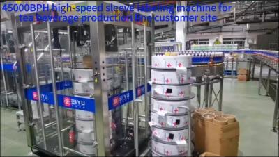 Cina 45000BPH Sleever riduttore ad alta velocità per la linea di produzione di bevande da tè sito del cliente in vendita