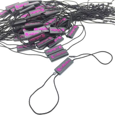 China Viable Wholesale Custom Embossed Brand Logo Printed Plastic Tag Label String Plastic String For Clothing Bags Jeans Luggage Shoes for sale