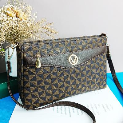 China 2023 high quality fashion trends women cross - body tote bags designer high quality custom brand ladies PU leather bag in stock for sale