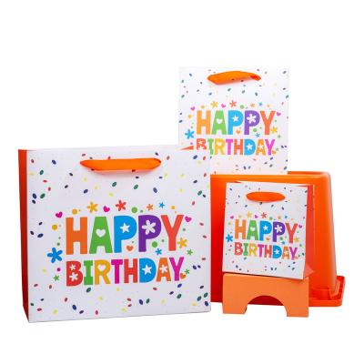 China Recyclable Custom Printed Gift Paper Bags With Handles for Shopping Gift Package for sale