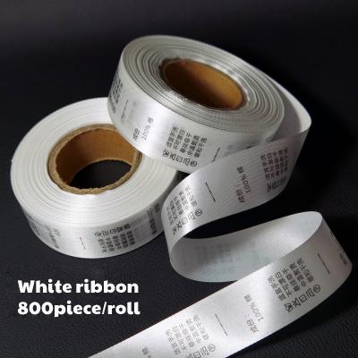 China Sustainable Private Label Wash Mark Stain Ribbon Ingredients Washing Label Apparel Home Textile LOGO Brand Accessories 800pc/roll for sale