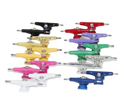 China New 2022 Zinc Alloy Solid Fingerboard Trucks Single Axle 32mm and 34mm Finger Skateboard Trucks 10 Colors with Lock Nuts for sale
