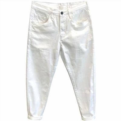China Breathable summer tapered slim black and white jeans pants for men korean trend stretch casual pants for men for sale