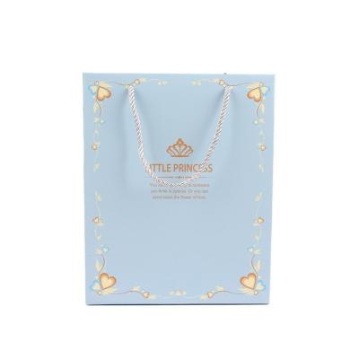 China Recyclable Custom Logo Small Princess Clothing Gift Paper Bag With Handle for sale