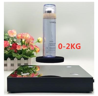 China square base magnetic levitation bottom 2kg bottle shoes display stands for sale