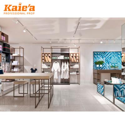 China Fashion fashion clothing store decoration women clothes store display rack for clothing store decoration design for sale