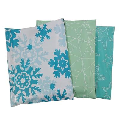 China 9.8x11.6inch 25x29.5cm waterproof colorful poly mailer wraps mix style poly mailer self seal envelopes for sale