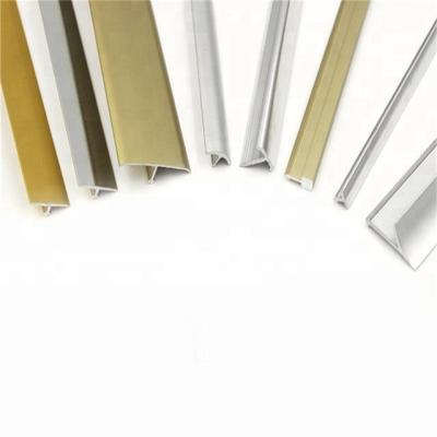China Modern Aluminum Furniture Building Material Flexible Decorative Plastic T Shape Metal Thin Transition Strips From Foshan Factory for sale
