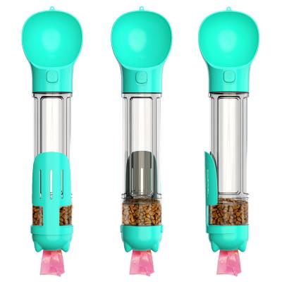 China Stored Pet Products 500ml Multifunctional Eco-friendly Outdoor Dog Water Bottle With Poop Bag Kettle Food Drinking Bottle for sale