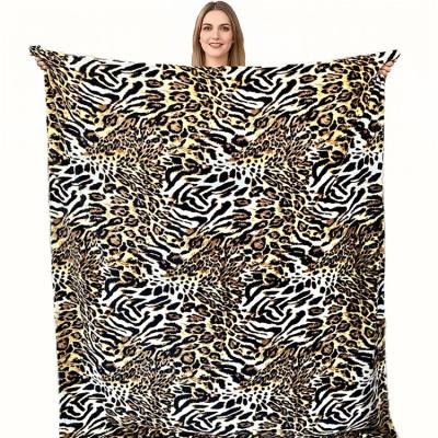 China Wholesale Custom Folded Print Leopard Print Pattern Throw Blanket Super Soft Flannel Fleece Blanket For Winter for sale
