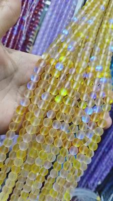 China Yellow matte mermaid glass round bead for making crafts for sale