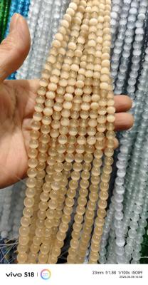 China 4/6/8/10/12mm round beads Light champagne cat eye for sale