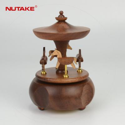 China Music Sound And Rotation Motion Activated Beautiful Gift Wind Up Wooden Carousel Horse Music Box for sale