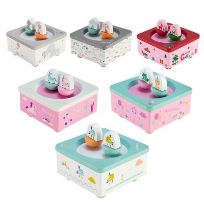 China Two dolls rotation and revolution with music La doyee dolls wavy children's cute wooden rotation music box for children for sale