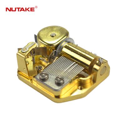 China A part of golden luxury music box 18 note musical movement for sale