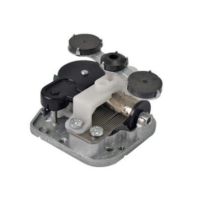China Part of standard music box 18 note cogs music box machine part with rotating magnets for sale