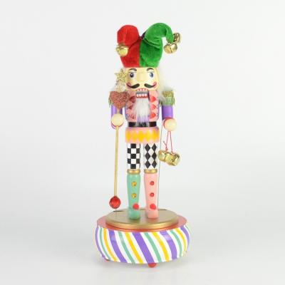 China 2021 New Product Christmas Collection Clown Walnut Soldier Wooden Christmas Music Nutcracker for sale