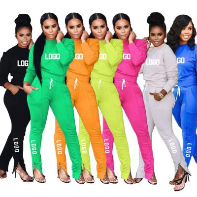 China Anti-wrinkle A8028 Wholesale Tracksuits 2021 Zipper Feet Drop Trotter Set SweatSuit LOGO Women Sweat Suit Sets Custom Pullover Sweatshirt for sale