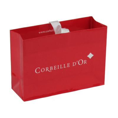 China Personality Recyclable Wedding Red Labeled Paper Shopping Bags for sale