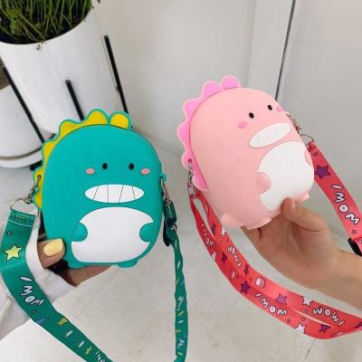 China 2021 Fashion Candy Silicone Material Mini Kid Jelly Bags For Children Wide Shoulder Coin Purse Cross Children Favor Dinosaur Purse for sale