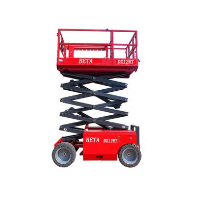 China DX12RT 12m Self Propelled Hotels Diesel Rough Terrain Mobile Scissor Lift Table On Tracks for sale