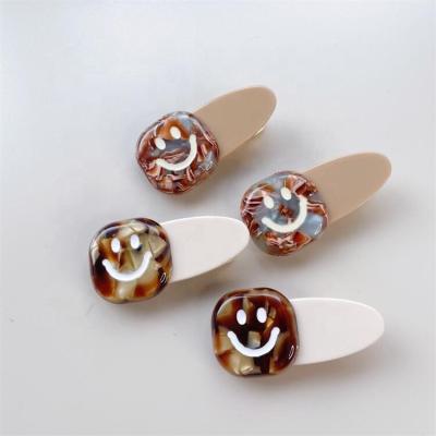 China Cartoon trend acetic acid face headwear cartoon trend duckbill clip cute smiling side girls hairpin clip decoration new for sale