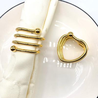 China Luxury Napkin Ring Wedding Party Gatherings Morden Napkin Holder Heart Patter Table Supplies Banquet Dinner Napkin Home Decor for sale