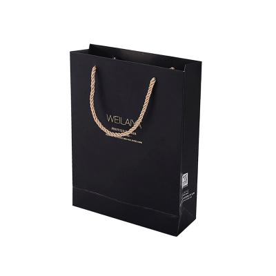 China 19092704 Disposable Custom Black Color Print Logo Gift Wrapping Paper Bag With String for sale