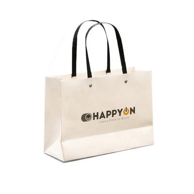 China Recyclable Exhibition Use Grocery Paper Carry Paper Bag Customized Printing for sale
