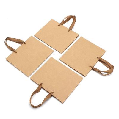 China Handmade Brown Kraft Paper Gift Bag With Handle Industrial Outer Item Packaging for sale