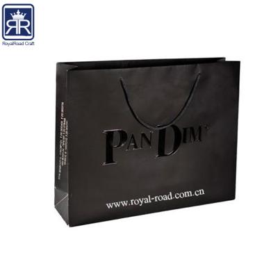 China Disposable Custom Logo Brand Name, Facebook, Instagram, Twitter, QR Code Printed Clothing / Jeans / Jacket Paper Bag With Handle for sale