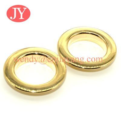 China Glossy gold 21x12x4.5mm Nickle free High quality brass metal shoe eyelets and grommet for clothing for sale