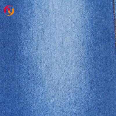 China Breathable cheap prices cotton knitted denim jeans cloth material fabrics satin elastic denim Mussel high quality raw stretch denim fabric for sale